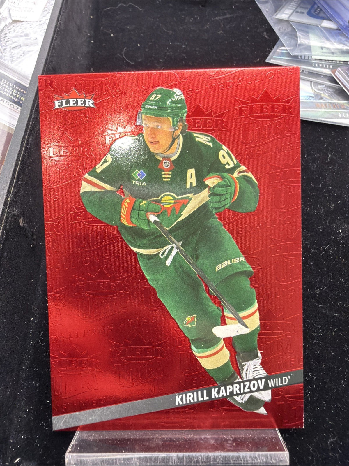 2025-26 Upper Deck Fleer Ultra Medallions Ruby Red /50 Kirill Kaprizov #M-170