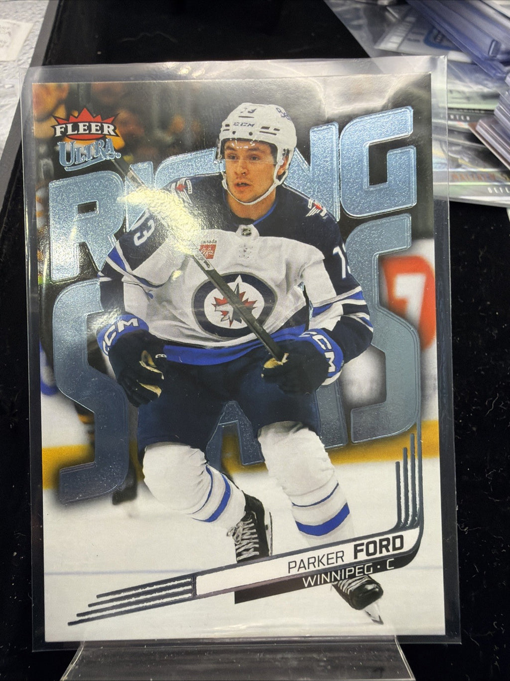 2025-26 UD Fleer Ultra Rising Stars PLATINUM Parker Ford /99 - Winnipeg Jets0